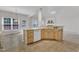 Bright eat-in kitchen with light wood cabinetry and an open floor plan at 308 Ravenstone Dr, Cary, NC 27518
