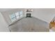 Open living room with a fireplace, complemented by natural light, providing a cozy and inviting ambiance at 308 Ravenstone Dr, Cary, NC 27518