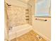 Updated bathroom with tile shower, modern fixtures, and plenty of natural light at 309 19Th St, Butner, NC 27509