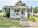 Charming home with covered porch, front lawn, and easy access with minimal stairs at 309 19Th St, Butner, NC 27509