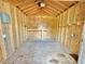 Interior of shed featuring exposed wood framing, ample space, and potential for storage or workshop at 309 19Th St, Butner, NC 27509