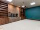 This bonus room features a brick fireplace and wooden built-in shelves at 315 King George Loop, Cary, NC 27511