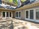 Wide wooden deck featuring multiple entrances to the home and space for entertaining at 315 King George Loop, Cary, NC 27511