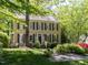 Traditional two-story home with blue shutters and inviting front porch at 315 King George Loop, Cary, NC 27511