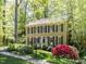 Inviting home with a well-kept lawn and vibrant landscaping at 315 King George Loop, Cary, NC 27511