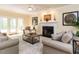 Spacious living room featuring a fireplace and stylish furnishings at 315 King George Loop, Cary, NC 27511