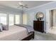 Bright main bedroom features an ensuite bathroom and access to a private deck at 315 King George Loop, Cary, NC 27511