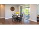 Cozy dining area with sliding glass doors leading to the deck and outdoor space at 3209 Star Gazing Ct, Wake Forest, NC 27587