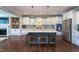 Spacious kitchen featuring a center island with seating, stainless steel appliances, and ample counter space at 3209 Star Gazing Ct, Wake Forest, NC 27587