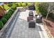 An outdoor living space with paved patio, fire pit and outdoor furniture at 3209 Star Gazing Ct, Wake Forest, NC 27587