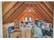 Spacious attic featuring exposed wood beams and natural light at 3214 Saddle Club Rd, Mebane, NC 27302