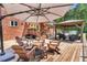 This large back deck includes multiple seating areas, a pergola, and is perfect for entertaining at 3214 Saddle Club Rd, Mebane, NC 27302