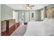 Spacious bedroom with hardwood floors, large windows, and dresser at 3214 Saddle Club Rd, Mebane, NC 27302
