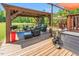 This pergola is perfect for relaxing in the backyard, it features comfortable seating and shade at 3214 Saddle Club Rd, Mebane, NC 27302