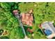 Stunning aerial view of the property showing the landscaped yard, patio, and surrounding greenery at 3581 Boulder Ct, Wake Forest, NC 27587