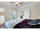Neutral bedroom featuring a bed and view of the outdoors at 3581 Boulder Ct, Wake Forest, NC 27587