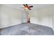 Bedroom with carpeted floor, ceiling fan and double door closet at 3581 Boulder Ct, Wake Forest, NC 27587