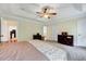 Main bedroom with tray ceilings and natural light from windows at 3581 Boulder Ct, Wake Forest, NC 27587