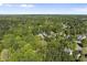 A high angle view of a neighborhood surrounded by many trees at 359 Heather Bluffs Dr, Garner, NC 27529