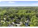 Aerial view of a neighborhood surrounded by lush greenery and trees at 359 Heather Bluffs Dr, Garner, NC 27529