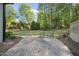 A large backyard with a patio area and manicured lawn at 359 Heather Bluffs Dr, Garner, NC 27529
