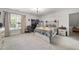 This bedroom has neutral carpeting, a window and a gaming center at 359 Heather Bluffs Dr, Garner, NC 27529