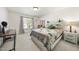 Bedroom with warm natural light, modern decor, and a neutral color scheme at 359 Heather Bluffs Dr, Garner, NC 27529