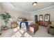 This bedroom features neutral walls, carpeted floors, and custom woodwork throughout the space at 359 Heather Bluffs Dr, Garner, NC 27529