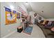 Spacious bonus room decorated with Clemson University memorabilia and furnishings for comfortable seating at 359 Heather Bluffs Dr, Garner, NC 27529