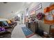 Bonus room featuring a large sectional sofa, entertainment center, and Clemson themed decor throughout at 359 Heather Bluffs Dr, Garner, NC 27529