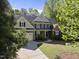 Charming two-story home with lush landscaping and a driveway at 359 Heather Bluffs Dr, Garner, NC 27529