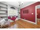 Bright sitting room featuring a window seat with natural light and built-in bookshelves at 359 Heather Bluffs Dr, Garner, NC 27529