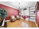 Cozy sitting room with built-in shelving, window seat, and natural light at 359 Heather Bluffs Dr, Garner, NC 27529