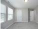 A carpeted bedroom with lots of natural light coming through the window at 3804 Delves Ln, Raleigh, NC 27616