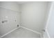 Laundry room with tile floor and appliance hook-ups at 3804 Delves Ln, Raleigh, NC 27616