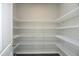 Walk-in pantry with wire shelving offers ample storage space at 3804 Delves Ln, Raleigh, NC 27616