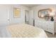 This bedroom is bright and cozy with white walls and minimalist decor at 3853 Rosebush Dr, Zebulon, NC 27597