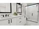 Bright bathroom with double vanity, modern fixtures, and glass-enclosed shower with marble tiling for a luxurious feel at 3926 Lost Fawn Ct, Raleigh, NC 27612
