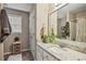 Well-lit bathroom features granite countertop, drawers and walk-in shower at 40 Senter Farm Ct, Fuquay Varina, NC 27526