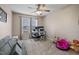 Cozy bedroom with ceiling fan, carpet, and a window view at 40 Senter Farm Ct, Fuquay Varina, NC 27526