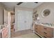 This Bedroom boasts a dresser, crib, and closet for ample storage at 40 Senter Farm Ct, Fuquay Varina, NC 27526