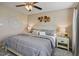 Relaxing bedroom with neutral tones, ceiling fan, and natural light at 40 Senter Farm Ct, Fuquay Varina, NC 27526