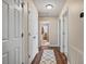 Hallway with hardwood floors and white trim, leading to bedrooms and bathrooms at 40 Senter Farm Ct, Fuquay Varina, NC 27526