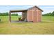 Detached outbuilding on large lot, great for storage or as a workshop at 40 Senter Farm Ct, Fuquay Varina, NC 27526