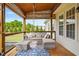 Inviting covered porch featuring comfortable seating and a porch swing at 40 Senter Farm Ct, Fuquay Varina, NC 27526