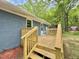 Enjoy outdoor living on this backyard wooden deck, accessible from the house at 42 S 2Nd St, Roxboro, NC 27573