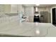 Close-up of kitchen featuring stone countertops and stainless steel appliances at 42 S 2Nd St, Roxboro, NC 27573