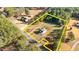 Aerial view of property featuring a home in a lush, tree-lined setting at 4208 Louisbury Rd, Wake Forest, NC 27587