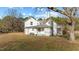 Exterior view of home from rear corner showing a screen porch at 4208 Louisbury Rd, Wake Forest, NC 27587