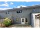 View of backyard with privacy fence, mature landscaping, and outdoor patio at 4318 Hunters Club Dr, Raleigh, NC 27606